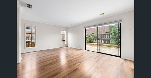 LIGHT-FILLED FAMILY HOME IN A CONVENIENT LOCATION - Photo 1