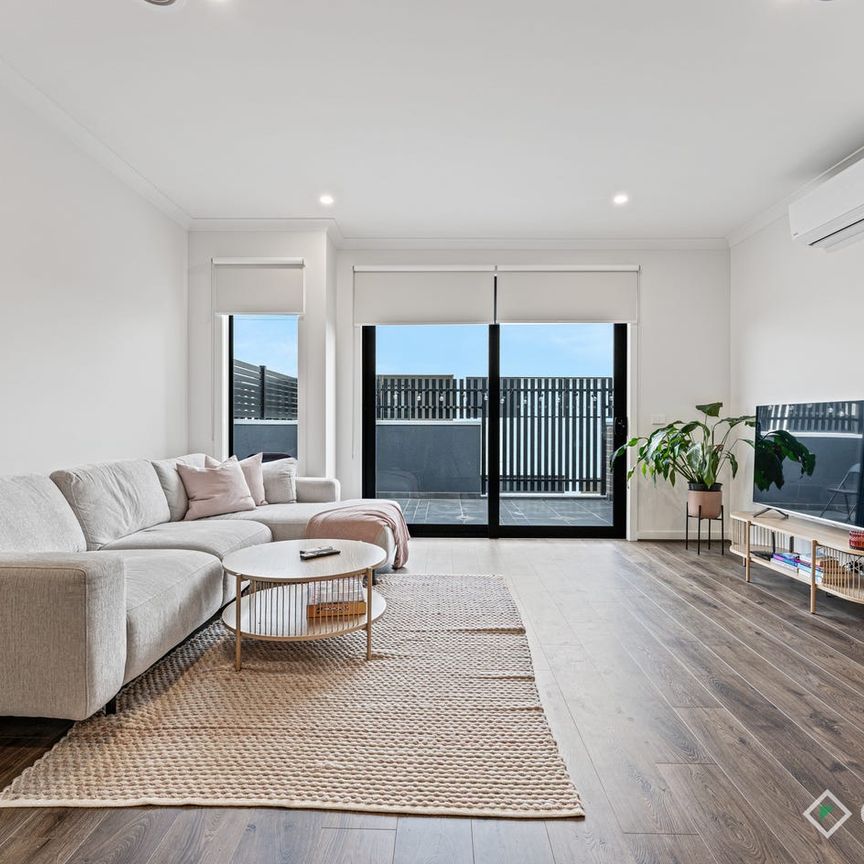 Stylish Townhouse Offering Space, Comfort, and Convenience - Photo 1