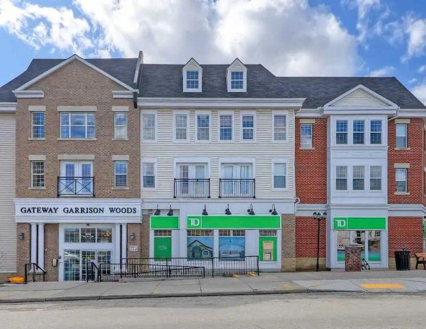 Top Floor Unit in Garrison Woods — 1 Bedroom+ Den Condo Unit - Photo 1