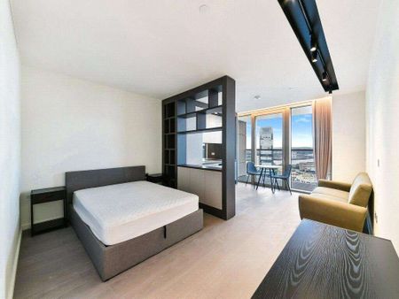 A spacious studio apartment in the sought-after One Park Drive development in Canary Wharf. Offered fully furnished, the apartment is well designed with practical storage throughout. - Photo 2