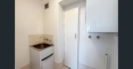 RECENTLY RENOVATED 2BR WITH 2 BATHS AND DISTRICT VIEWS - Photo 3