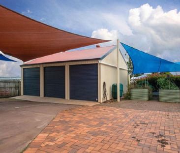 The Whole Package! Spacious 5-Bedroom Home + Sheds Galore! - Photo 4