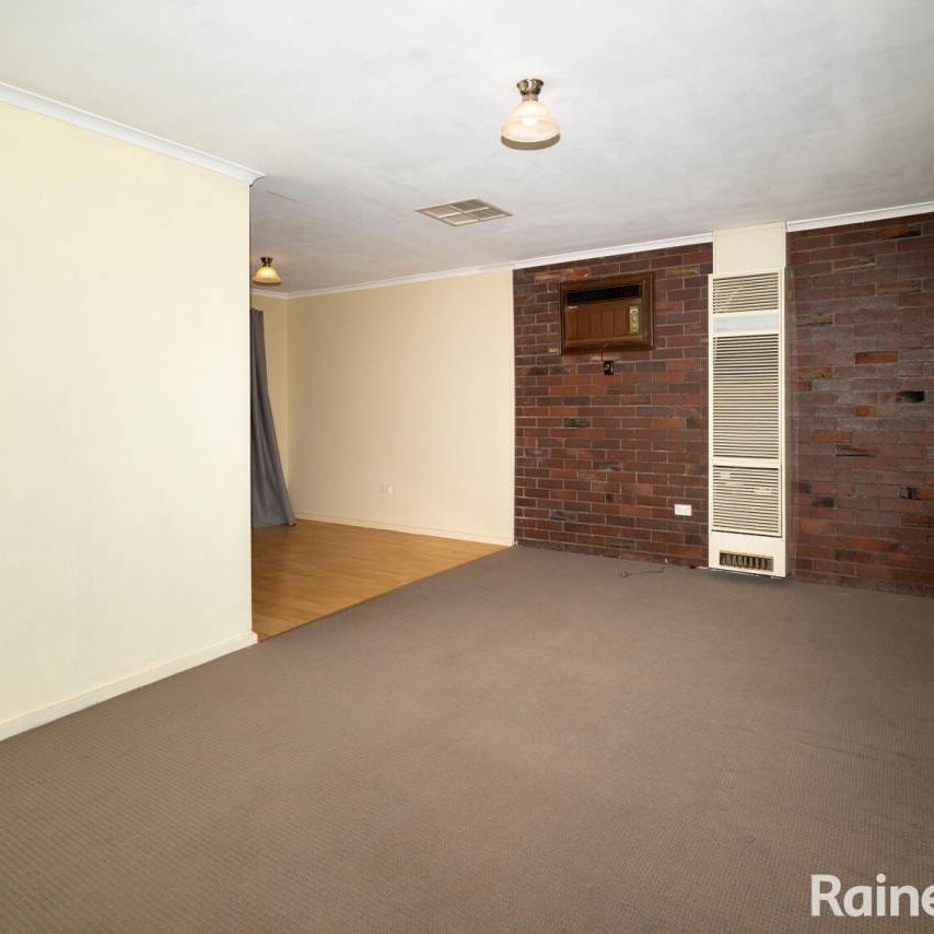 VERSATILE LAKE ALBERT HOME WITH SHEDS AND STUDY - Photo 1