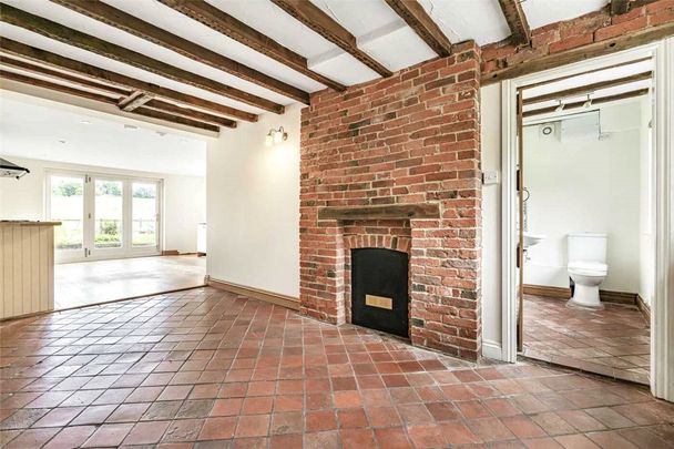 A detached two storey cottage originally constructed in the 1800's situated within the Village of Rugeley. - Photo 1