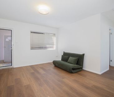 Beachside Living in a Super Cute 2 Bedroom! - Photo 4