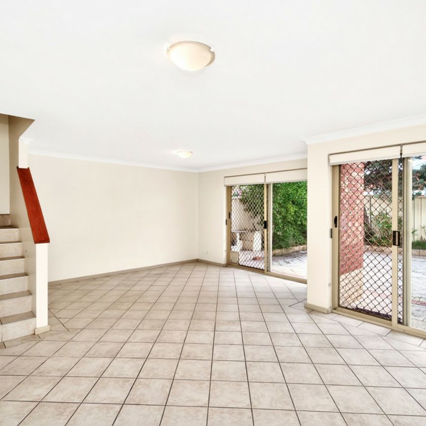 Delightful Two-Storey Townhouse in a Secure Complex - Photo 1