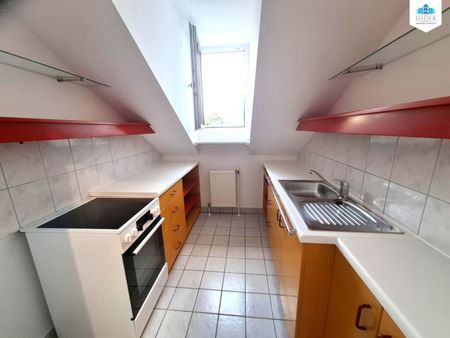 Dachgeschosswohnung in großartiger Lage - Photo 3