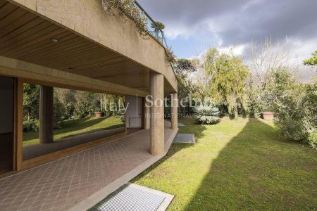 Elegante appartamento con giardino e piscina - Photo 3