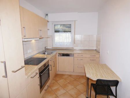 Renovierte 3-Zimmer-Wohnung mit Einbauküche in ruhiger und grüner Lage - Photo 4