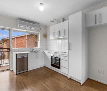 Light, Bright & Modern Low-Maintenance Unit Living - Photo 3