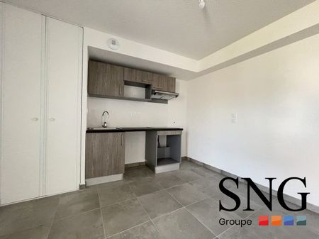 T3 AVEC BALCON ET UN PARKING COUVERT - Photo 3