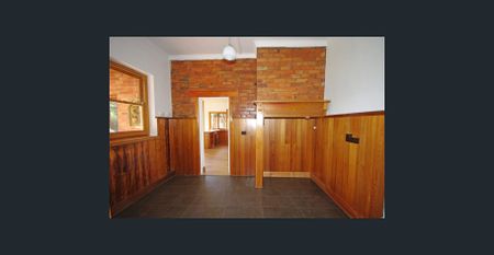 Spacious Family Home with Art Deco Charm in Prime Location - Photo 3