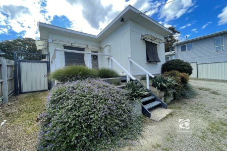 SHORT WALK TO THE BEACH! - Photo 2