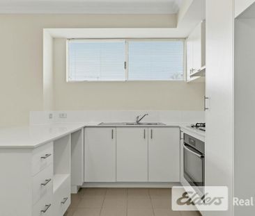 Freshly Painted Three-Bedroom Home! - Photo 6