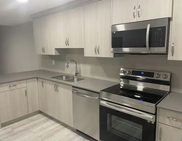 Cozy 2 Bedroom Basement Suite in Rangeview. December 2025 is rent FREE!! | 77 Mallard Grove Southeast, Calgary - Photo 1