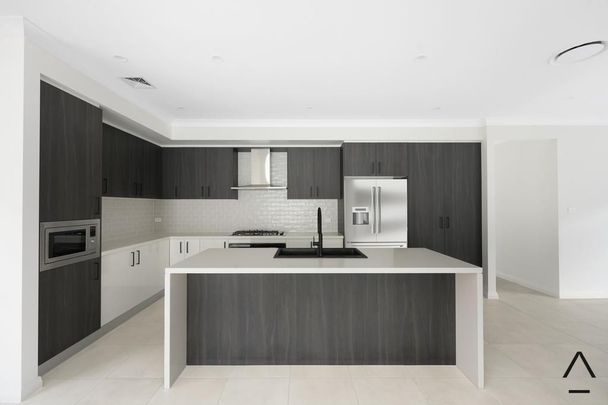 BRAND NEW 4-BEDROOM FAMILY HOME – QUIET STREET LOCATION - Photo 1