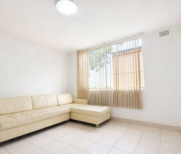 WELL-PRESENTED 2-BEDROOM UNIT IN A GOOD CABRAMATTA LOCATION - Photo 1