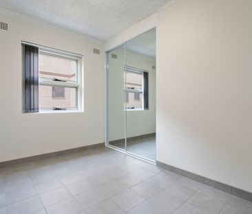 RENOVATED 2 BEDROOM UNITS WITH CAR SPACE - Photo 1
