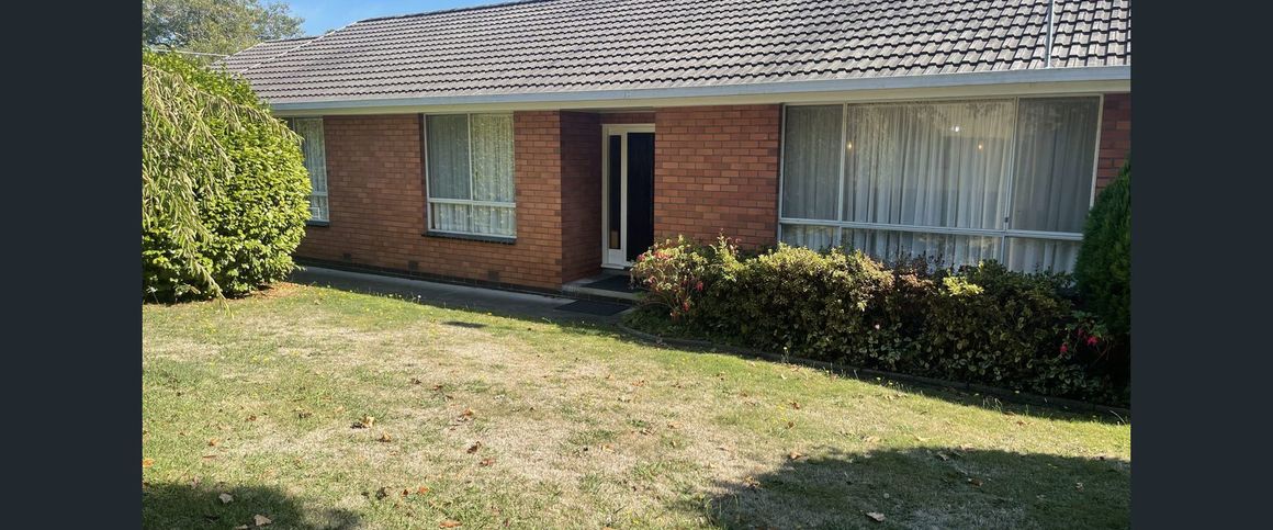 Neat Three Bedroom Home - Photo 1