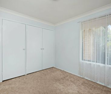 Neat & Tidy Two Bedroom Duplex in Popular Valentine Estate - Photo 2