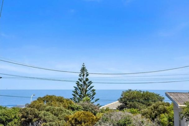 Coastal Convenience Meets Low-Maintenance Living - Photo 1