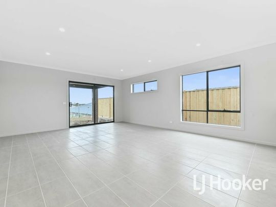 Brand New Four Bedroom Home! - Photo 1