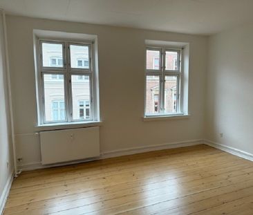 Skøn 3-værelses lejlighed i hjertet af Odense centrum. - Foto 1