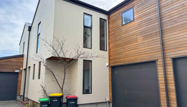 City Fringe Townhouse with Garage - Photo 1