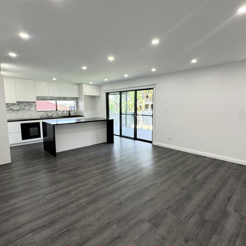 NEWLY RENOVATED FAMILY HOME - Photo 1