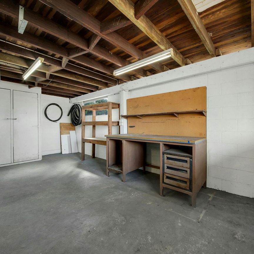 Spacious Family Home with Pool and plenty of Storage - Photo 1