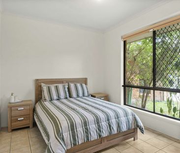 Move-In Ready Oasis: Fully Furnished 3BR Home with Secure Garage - Photo 1