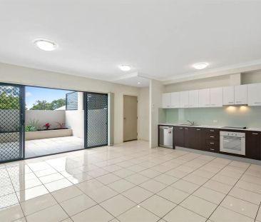 “Suave Villa-Style Townhouse” - Photo 1