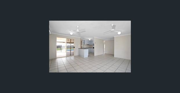 Situated in the premier suburb of Glenella, this well-presented, low set brick home is an absolute delight inside and out! Conveniently located in a f - Photo 1