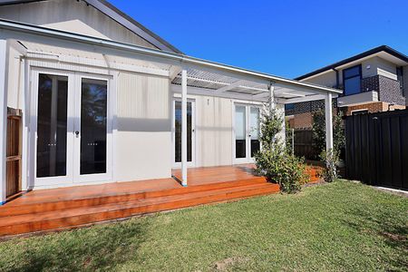 Beautiful 3-Bedroom Home with Versatile Living & Outdoor Appeal - Photo 4