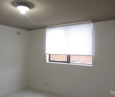 Spacious Second Floor Unit - Photo 2
