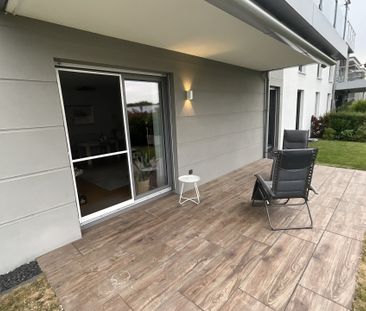 Moderne Neubauwohnung mit Loggia, Terrasse und Garten – inkl. TG-St... - Photo 3