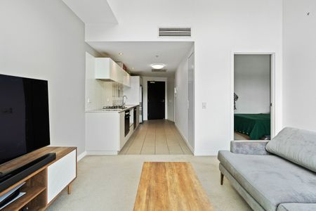 STYLISH ONE-BEDROOM APARTMENT WITH CAPTIVATING CITY VIEWS - Photo 2