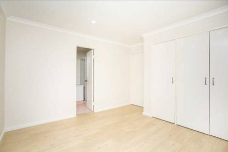 A Bright Three Bedroom Home with Its Own Courtyard - Photo 5