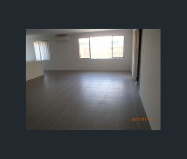 Convenient Living in a Quality Dual-Key Property - Photo 2