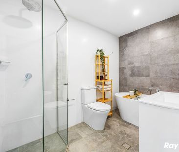 Modern & Spacious 2-Bedroom Apartment with Study - Photo 2