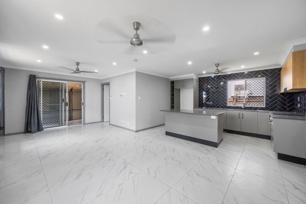 Charming Renovated Home with Shed - Photo 1