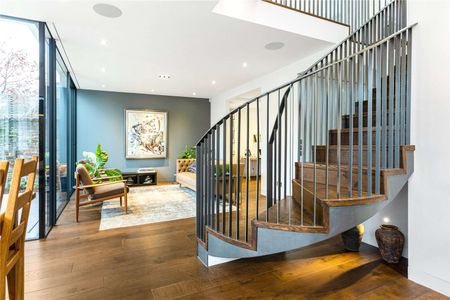 A stunning extended and meticulously refurbished house on arguably one of West Putney's prettiest streets. - Photo 2