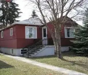 2-Bedroom Main Floor in RENFREW | 831-13 Avenue NE, Calgary - Photo 1