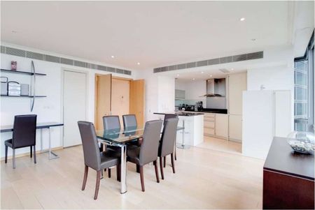 A luxury two-bedroom, two-bathroom apartment located on the 26th floor of No.1 West India Quay, E14, offering approximately 1,270 sqft of living space. - Photo 2