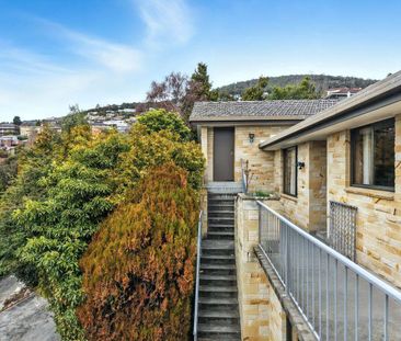 Tidy Two Bedroom Unit in a great location - Photo 3
