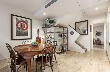 Stunning Split-Level Warehouse Conversion with Bay Views & Luxe Space - Photo 4