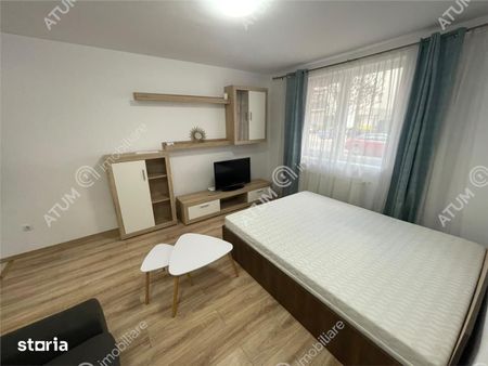Garsoniera decomandata loc parcare zona Brana Selimbar - Fotografie 4
