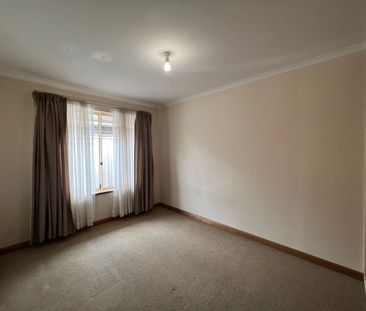 Large 4 Bedroom Home with 2 Living Areas! - Photo 1