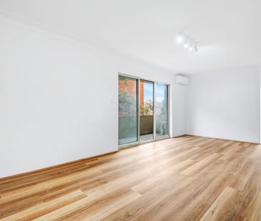 Conveniently Positioned, Completely Renovated 2 Bedroom Apartment - Photo 3