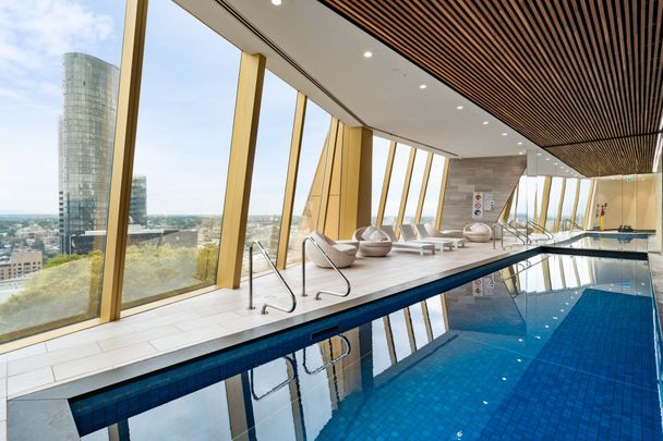 Stunning Rooftop Views and Premium Amenities - Photo 1